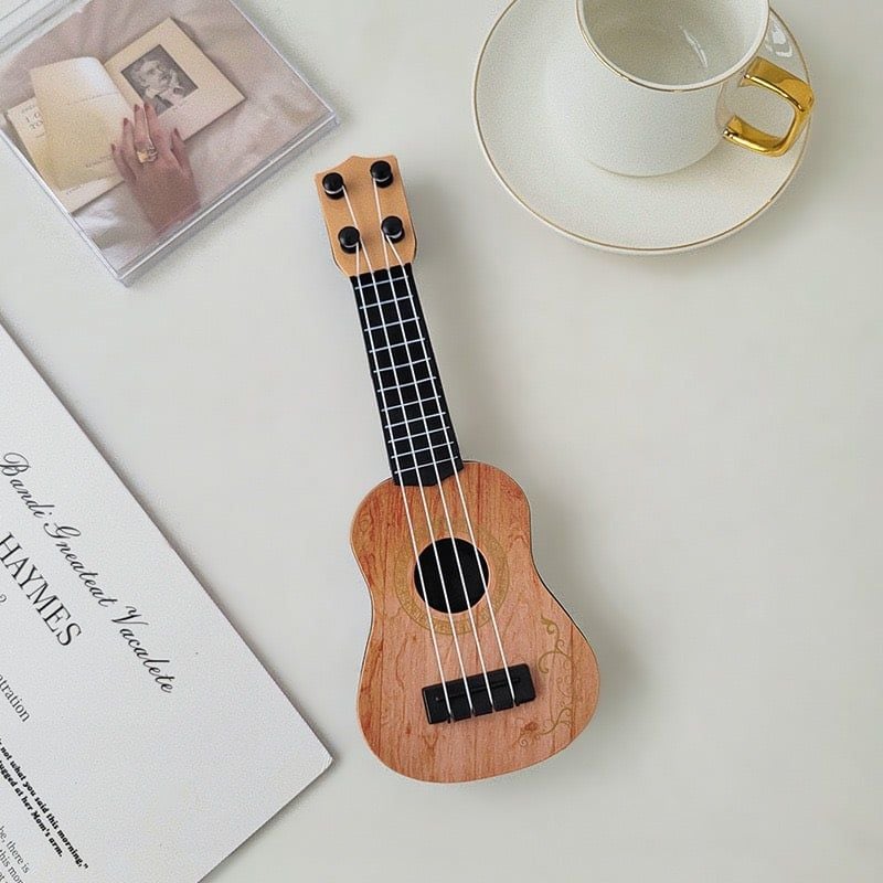 Cầm đàn ukulele